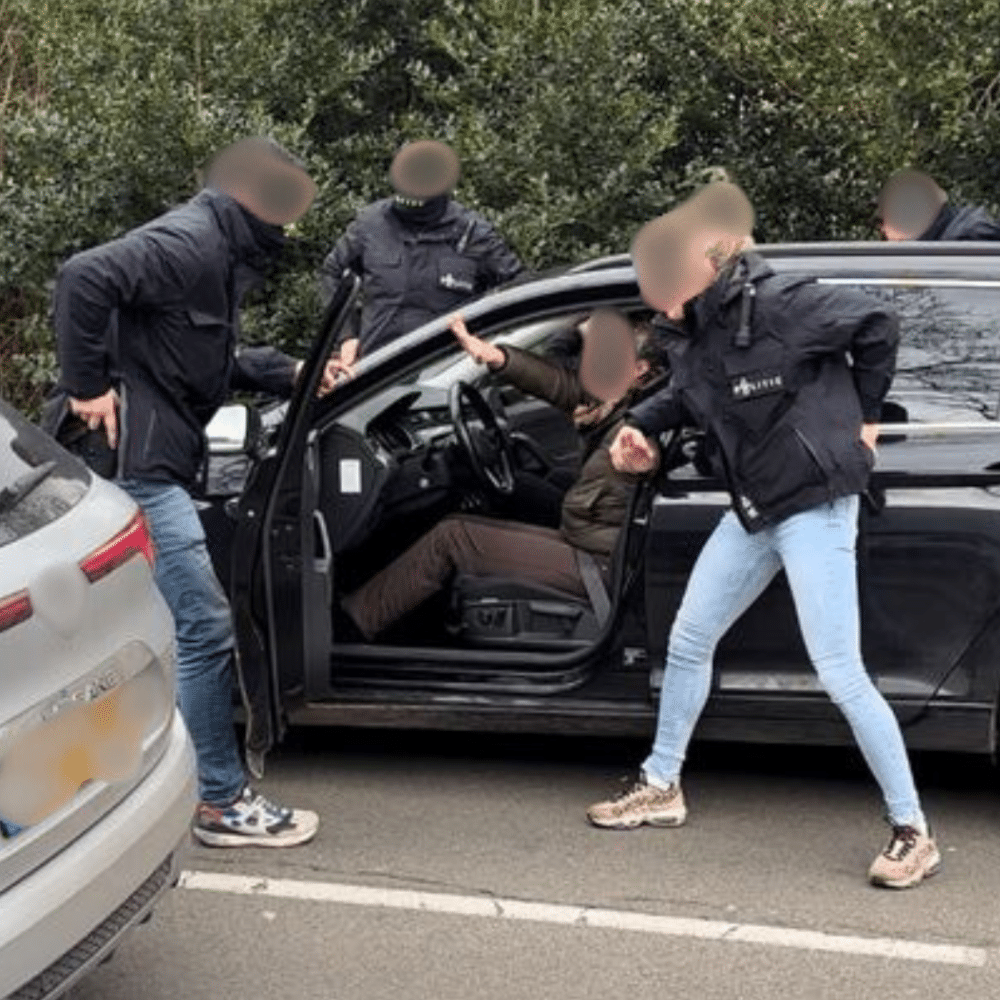persoon in auto, politie